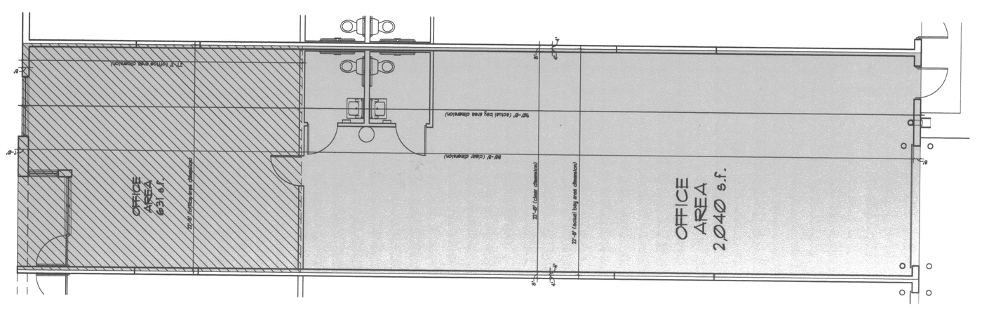 Typical Cortland Commercial Center II unit layout: office area at one end, two restrooms, and a long open bay