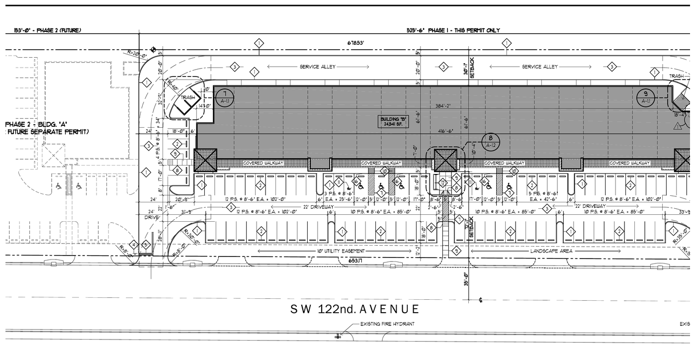 Site plan of Cortland Commercial Plaza: a long single-story retail building with parking along SW 122nd Avenue