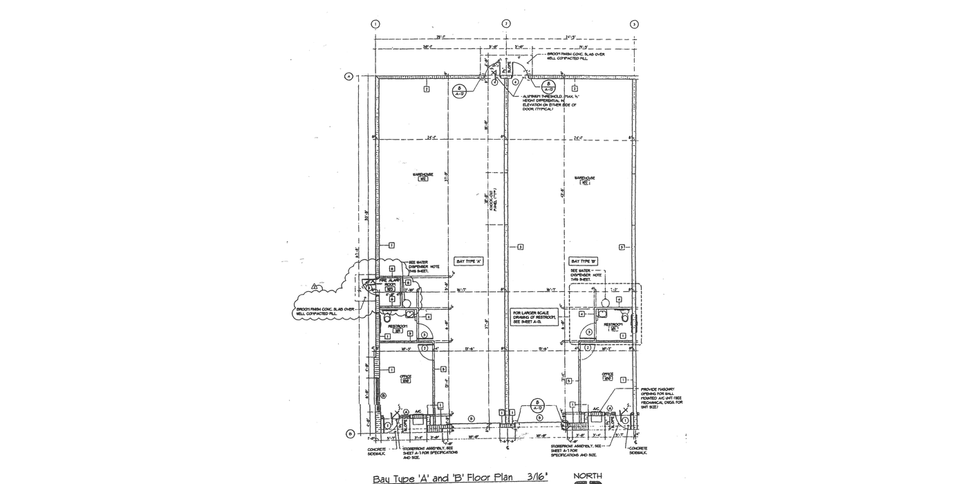 Floor plan of Bay Types A and B: warehouse floor with an office, a restroom and a storefront entrance at the front of each bay