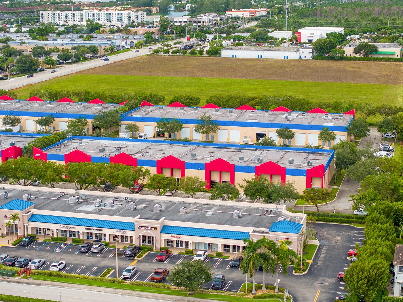 Wide aerial view of Cronus Equity industrial buildings and the surrounding Southwest Miami-Dade area