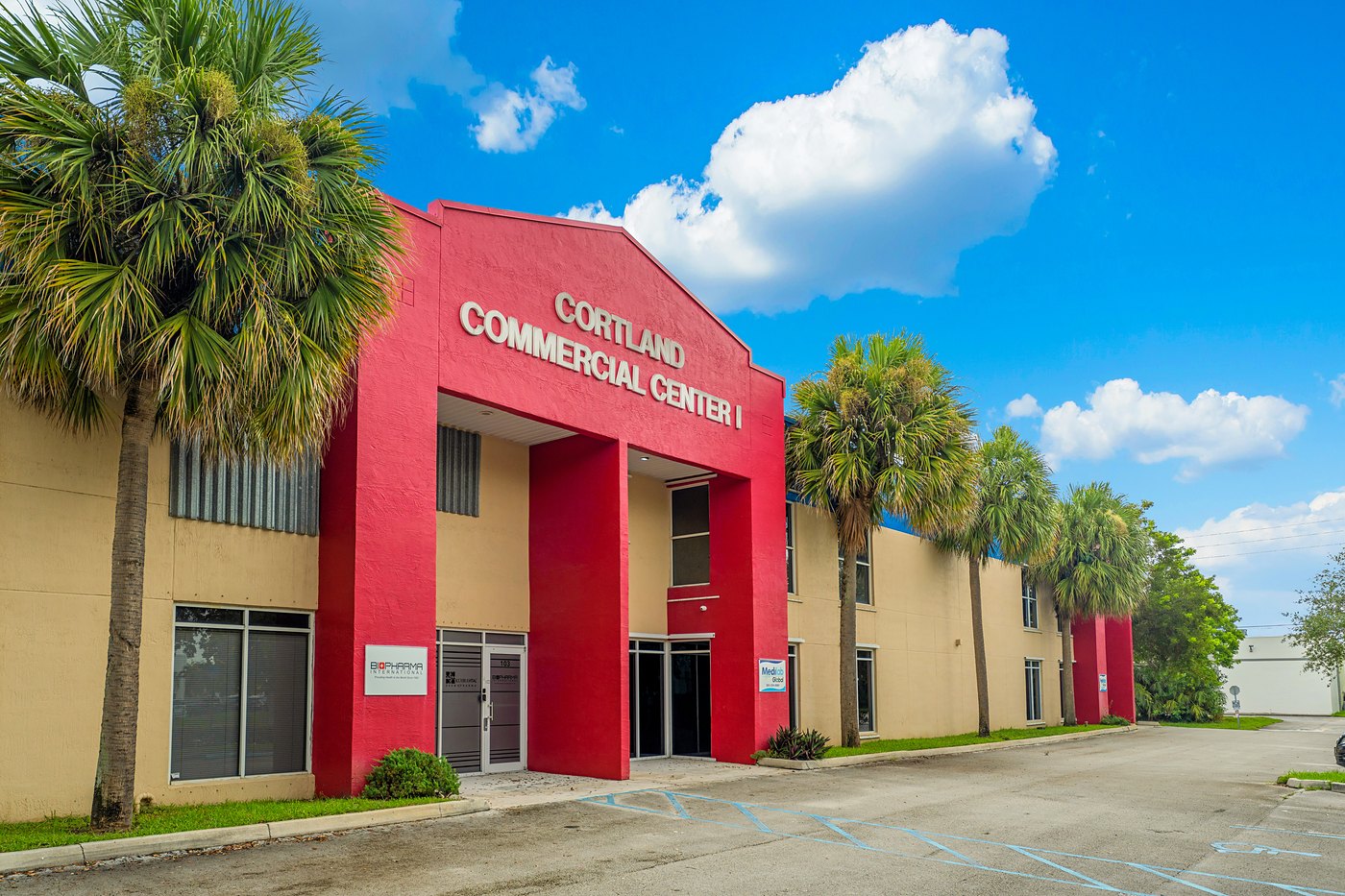 Cortland Commercial Center I signage on a red entry tower