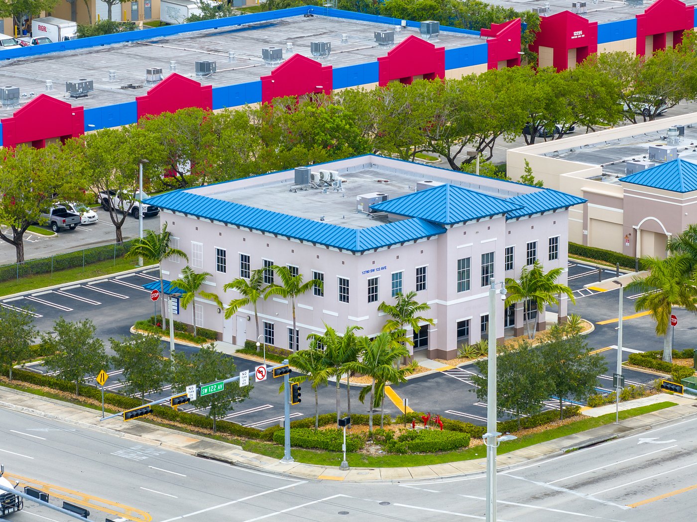 Aerial of Cortland Commercial Office, a two-story building with blue metal roofs at 12780 SW 122nd Avenue