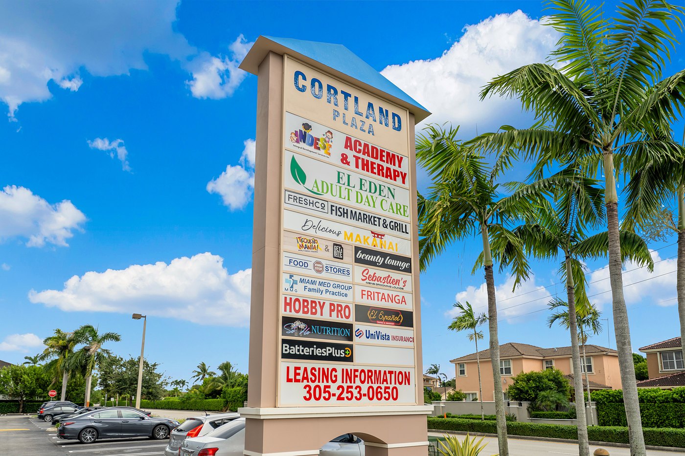 Cortland Plaza pylon sign with tenant panels and the leasing phone number, Cortland Commercial Plaza